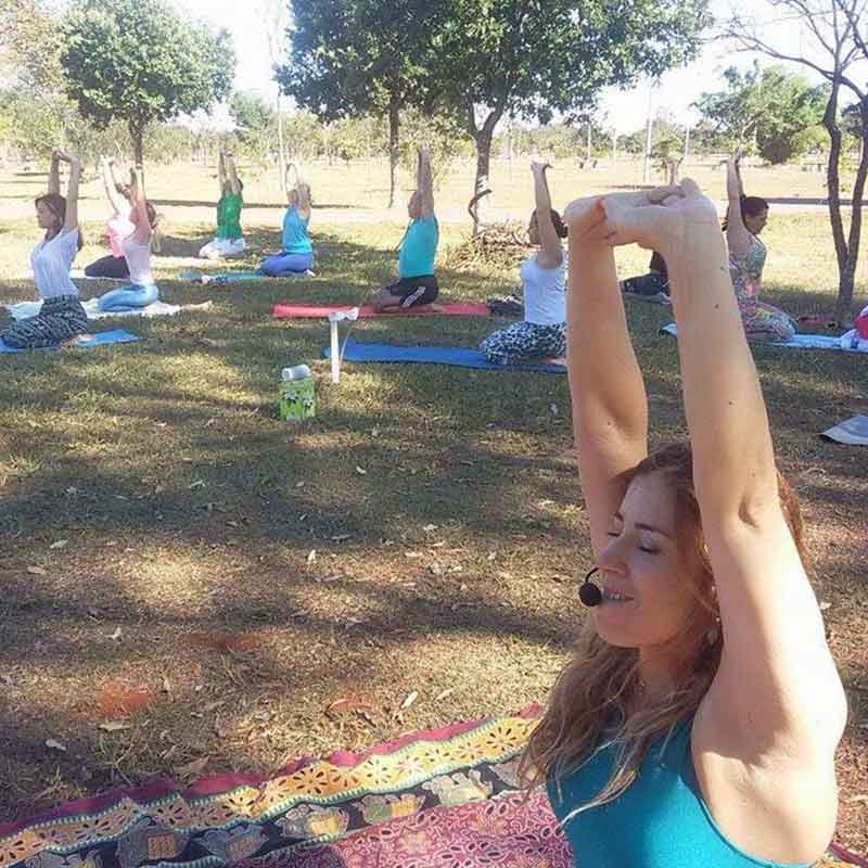 A yoga retreat conducted by a lady for a group of people