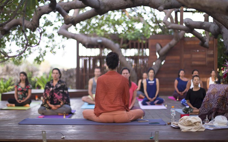 Group of people meditating at Convento Arcadia, Atins