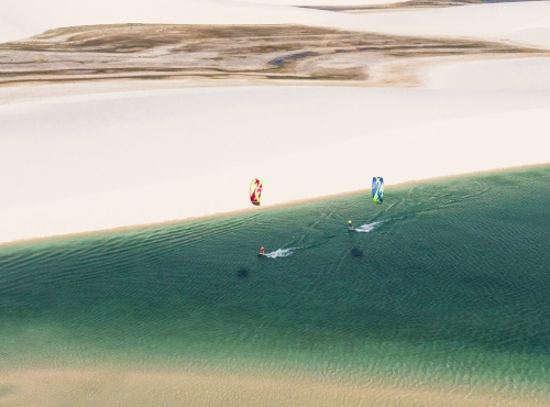 Ariel view of two people kitesurfing in Atins