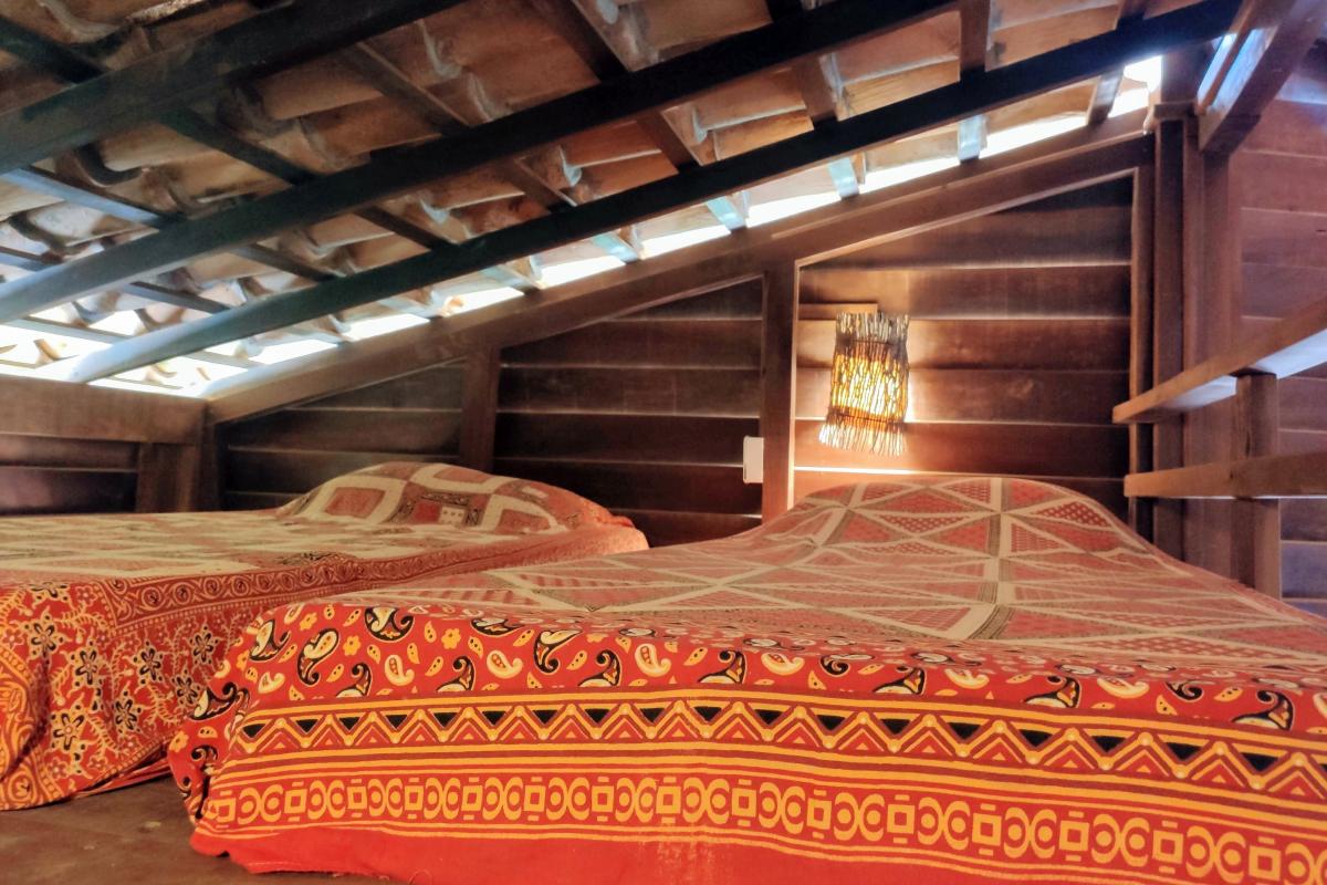 Upper deck bedroom of Premium Chalets Sixtuple at Convento Arcadia, Atins