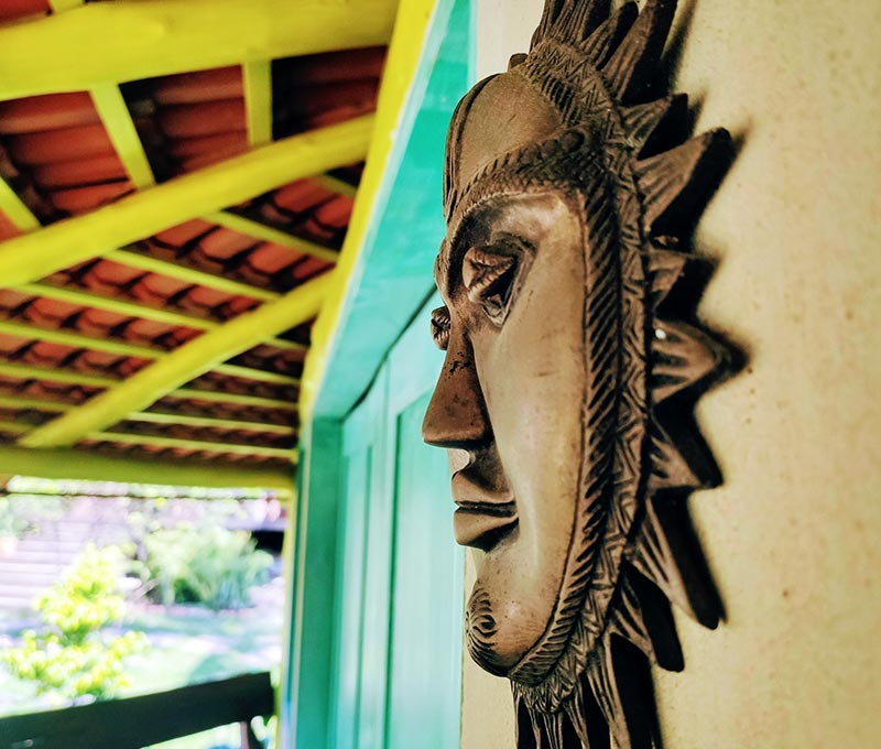 Designed piece of art hung outside the Standard Chalet Triple at Convento Arcadia, Atins