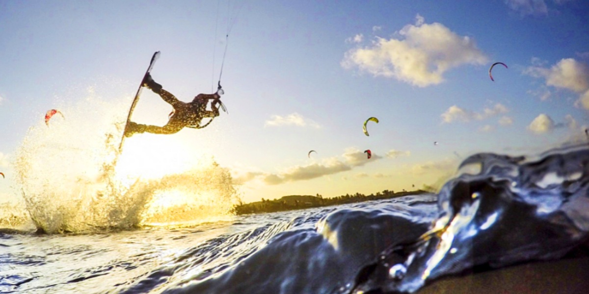 A person Kitesurfing in the ocean