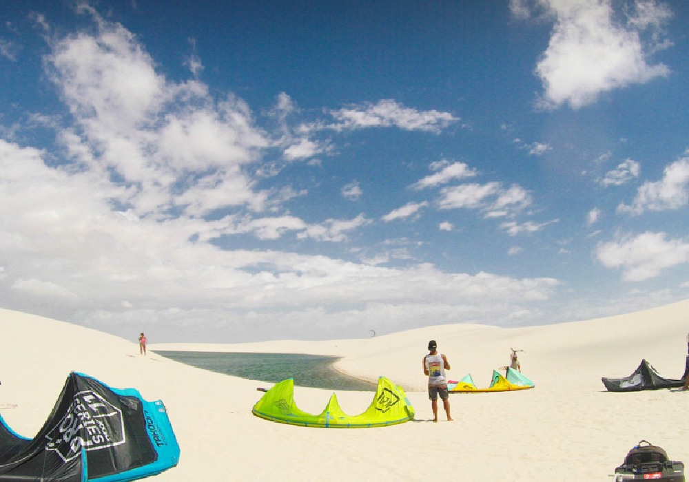 setting up for kite surfing at the beach