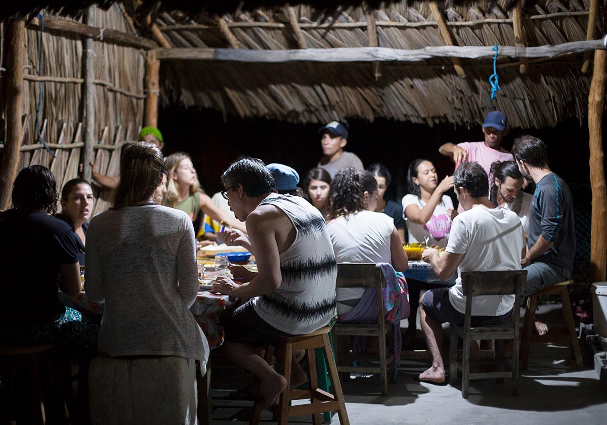 A group of tourists having dinner