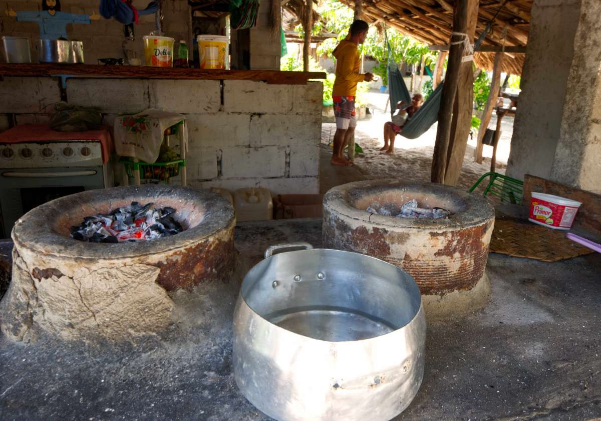 Two people relaxing and talking in a shop