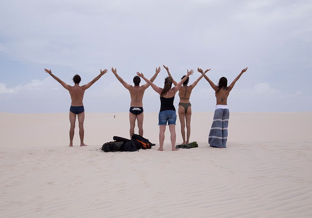 people enjoying at the beach