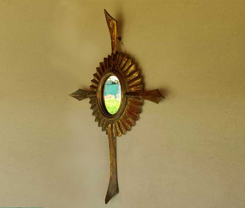 Designed mirror hung outside the Standard Chalet Double Room at Convento, Atins.