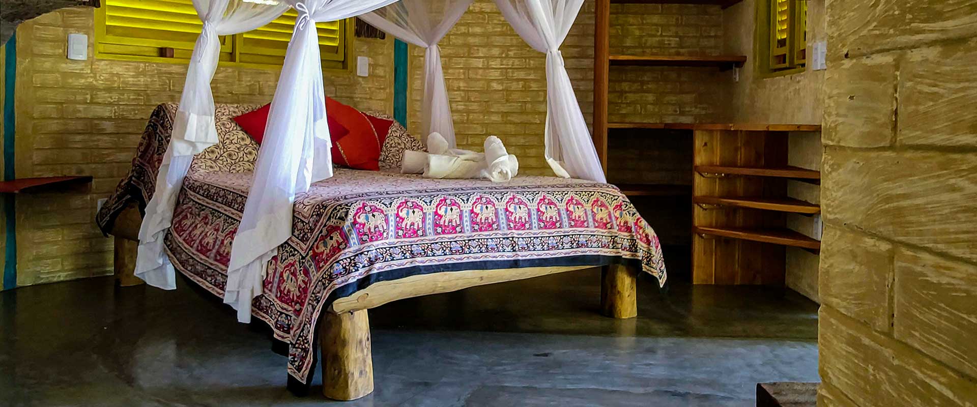 Bed of the Standard Chalet Double Room in Convento Arcadia, Atins